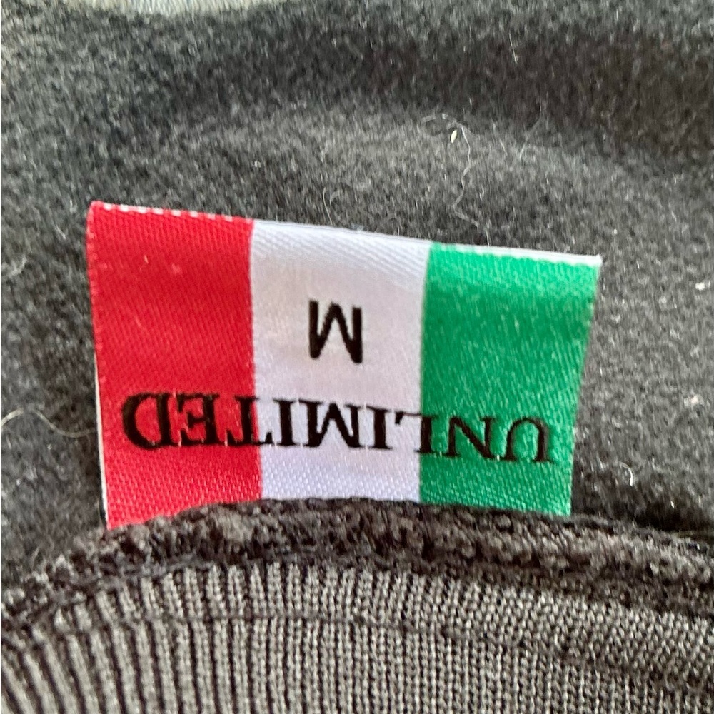 Black kids jacket. Long sleeves with ITALIA logos on front and back.  Size M.